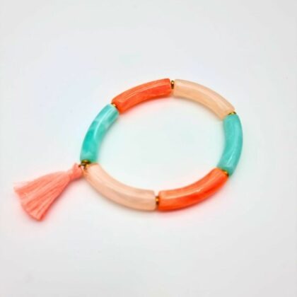 Bracelet en perles de résine colorées avec pompon en coton et perles d’hématite