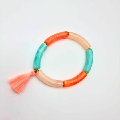 Bracelet en perles de résine colorées avec pompon en coton et perles d’hématite